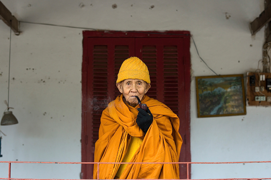 Senior Monk with Pipe