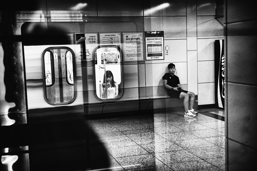 Reflections Inside The Seoul Metro