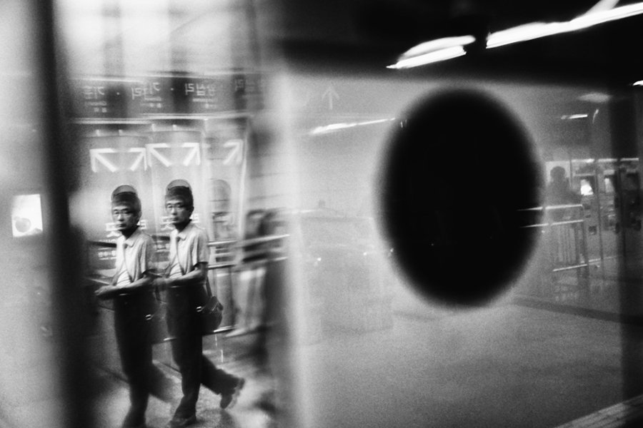Reflections Inside The Seoul Metro