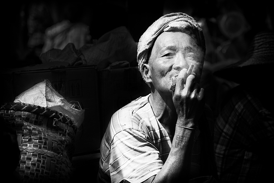 Smoking man in Helo’s market, Myanmar