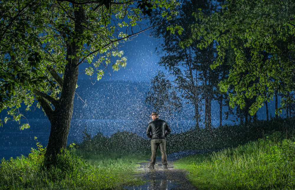 Alone in the rain at night