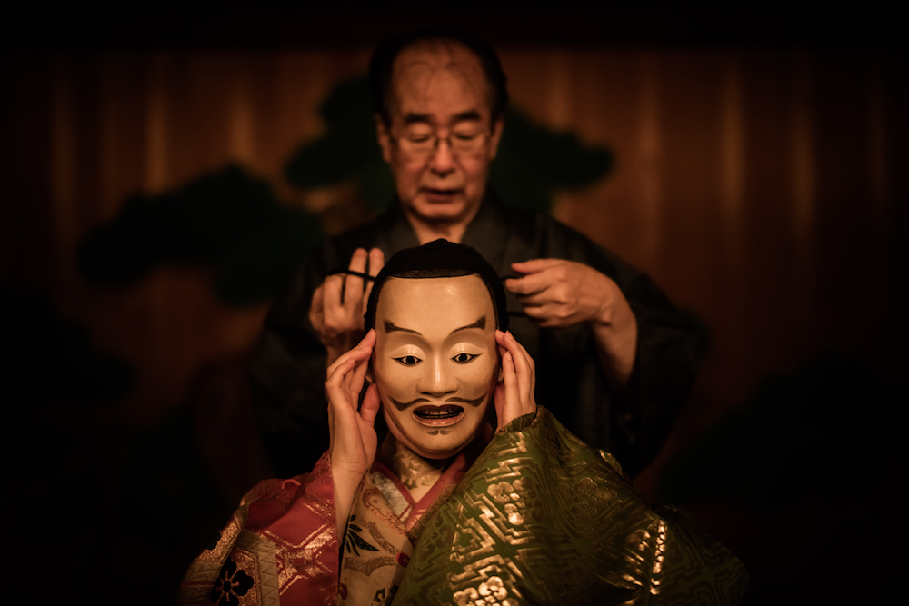 The ritual of the costume in Noh traditional theater.