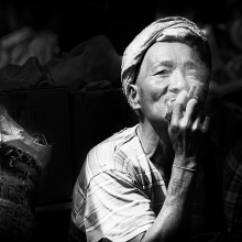 Smoking man in Helo’s market, Myanmar
