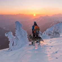 Snowboarder and his dog