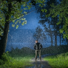 Alone in the rain at night