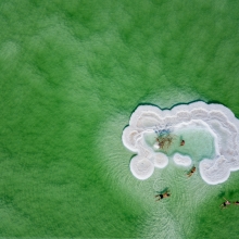 While the white ice in polars melts, The white salt in the lowest place starts to rise 